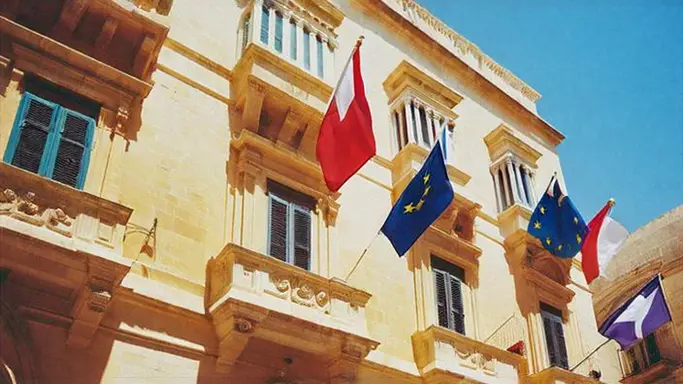 SMC nice building in Malta with flags